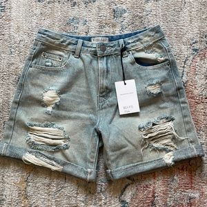 NEW Ripped jean shorts from a boutique. Brand is Blank Paige Denim Collection.